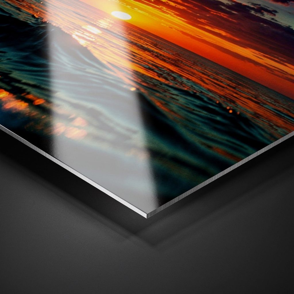 Close-up of a glossy metal print surface showing vivid colour and sheen